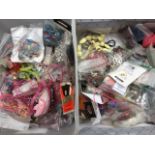 Two boxes of jewellery making materials - rings, clips, cords, beads, string, needles, stones,
