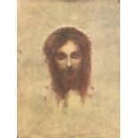 A framed trompe d'oeil Christ head wearing crown of thorns on cloth ground, the card laid down &