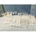 A quantity of drinking glasses - tumblers, sets, dessert glasses, wine, Edinburgh crystal, liquor