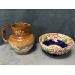 A circular Maling bowl decorated in apple blossom on sponged blue ground; and a Victorian salt