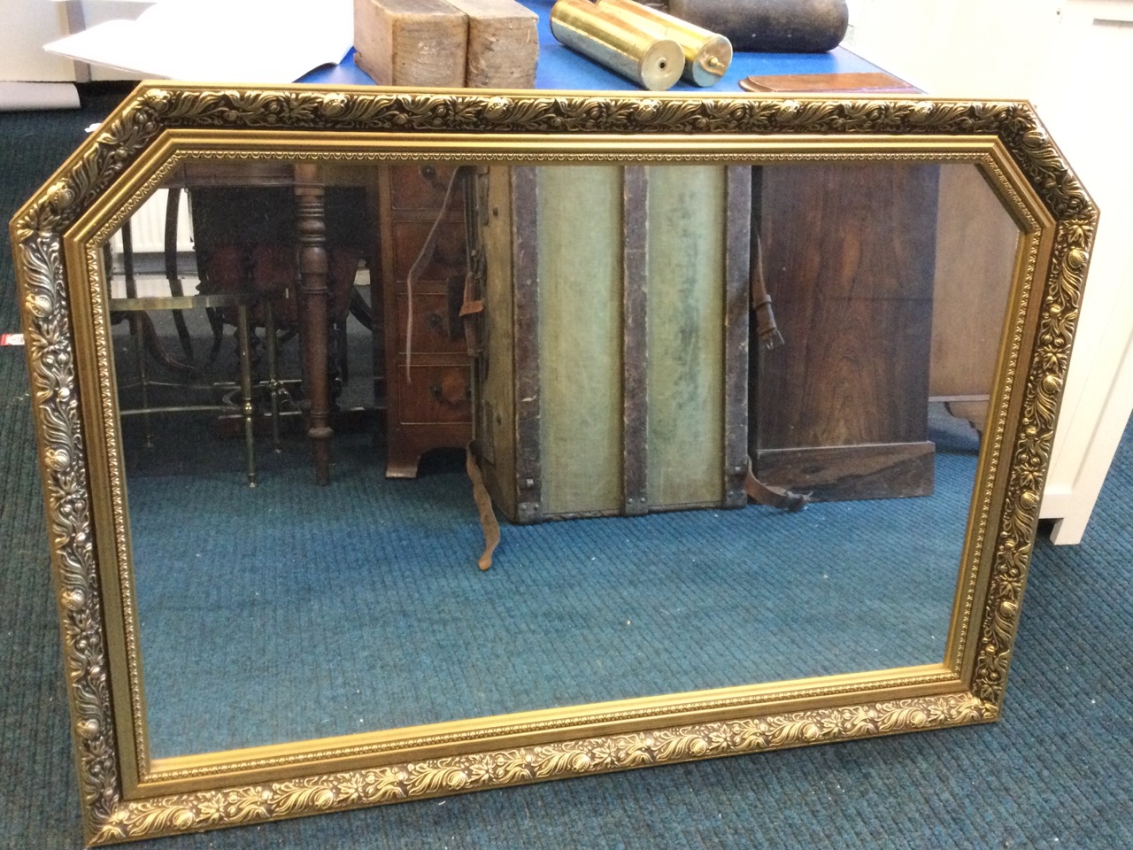 A rectangular gilt framed overmantle mirror, the plate in foliate moulded frame with canted corners. - Image 2 of 3