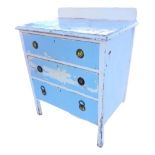A painted pine chest of drawers with rounded upstand above rectangular moulded top and three drawers