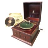 An Apollo gramaphone in stained caddy moulded case, the working turntable with diaphragm arm and