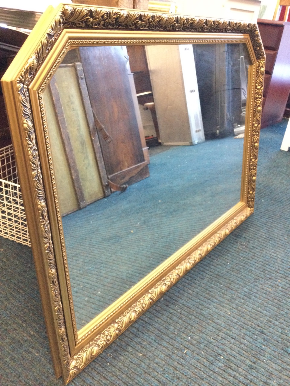 A rectangular gilt framed overmantle mirror, the plate in foliate moulded frame with canted corners. - Image 3 of 3