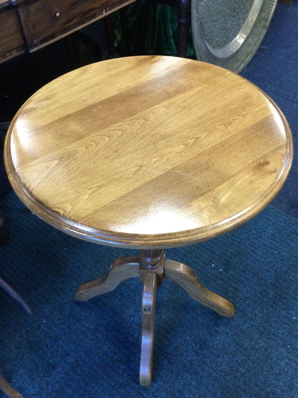 A circular occasional table with moulded top on turned column with quadripartite shaped legs. (19. - Image 2 of 3