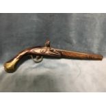 A nineteenth century Turkish flintlock with scrolled brass inlay to walnut stock, the lock,