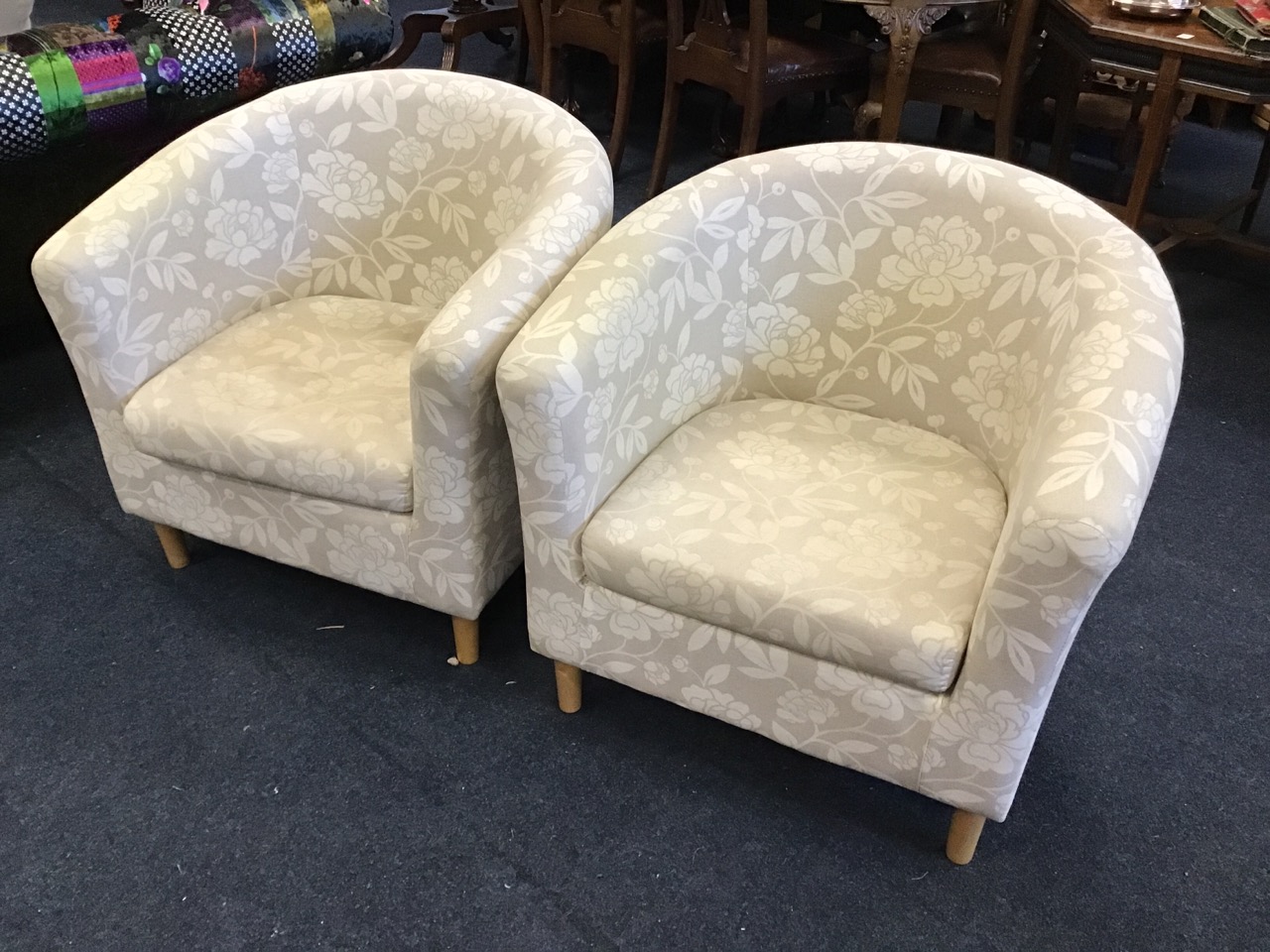 A pair of contemporary tub armchairs of horseshoe shape with loose cushions, raised on turned - Image 2 of 3