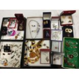 Miscellaneous jewellery including amber bead pieces, some silver, necklaces, pendants, pairs of