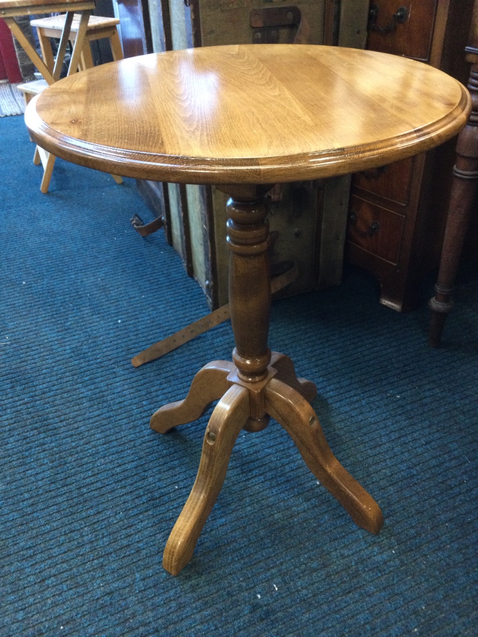 A circular occasional table with moulded top on turned column with quadripartite shaped legs. (19. - Image 3 of 3