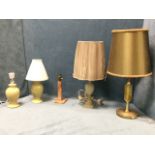 A pair of pale green glazed ceramic vase tablelamps; and three alabaster tablelamps - a column