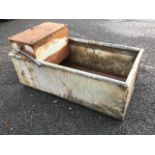 A rectangular 3ft galvanised trough with tubular rim, the end with water supply box compartment. (