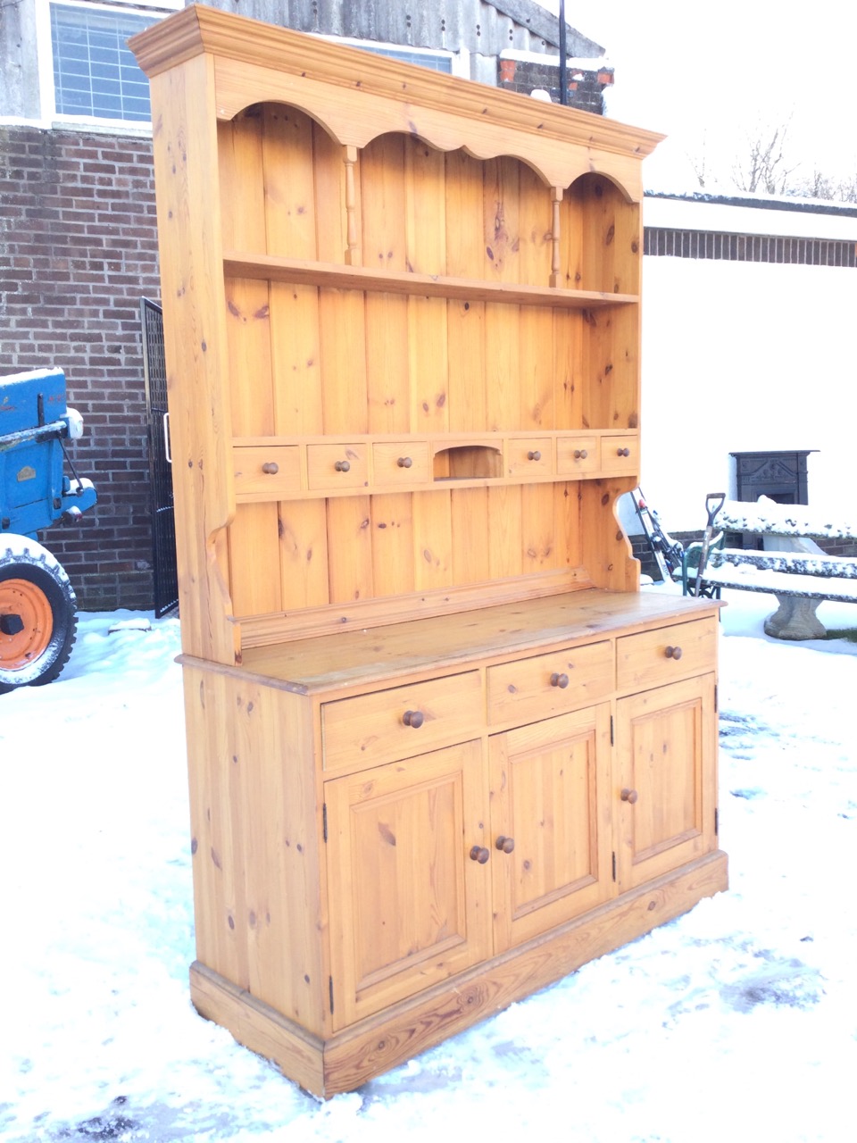 A pine dresser with moulded cornice to delft rack having shaped apron supported on spindles above an - Image 3 of 3