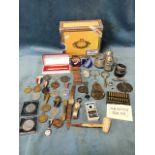 Miscellaneous collectors items including glass paperweights, a silver plated three-piece cruet,