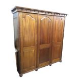 A Victorian style mahogany wardrobe by Karva, the cornice with applied turnings to frieze above