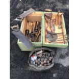Miscellaneous tools in a pine box including a set of lathe chisels, tenon saws, a pair of hardwood