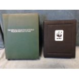 A volume of WWF first day covers, the stamps with information pages, coloured plates, etc, the