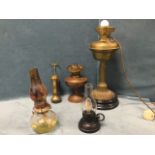 A Victorian brass oil lamp on fluted column with ceramic base - converted to electric; three other