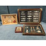 Three framed cased sets of maritime knots & rigging; and a cased set of colourful butterflies. (4)