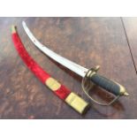 An Indian sabre with Islamic style foliage engraving to steel blade, with pierce brass guard and