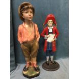 The Whistling Boy, a 1950s plastercast painted figure standing on plinth by trunk - 23.5in; and a