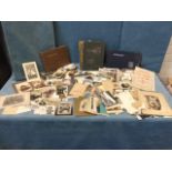 Three albums of family photographs, postcards, topographical views, mainly all C20th, some