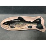 A Highland Stoneware fish dish, the handpainted platter moulded in fish shape. (17.25in)