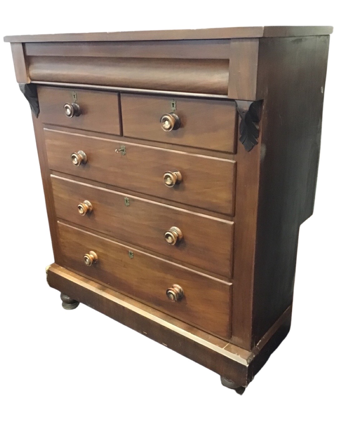 A Victorian mahogany scotch chest with rectangular top above a long cushion moulded frieze drawer