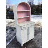 A painted dresser, the arched back with open plate shelves and tongue & grooved boarding, the base