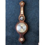 A nineteenth century mahogany barometer with shaped banjo case, having circular dry/damp dial