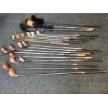 Eighteen miscellaneous golf clubs - Bubble Shaft Taylor Made, drivers, Ping, one antique with