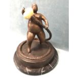 Contemporary bronze, Botero type cast figure on plinth, with rope supporting wood nut, on circular