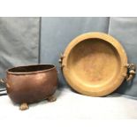 A bulbous oval C19th copper log bin with tubular rim raised on brass paw feet - 20.5in; and a