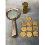 A collection of 10 George III gaming tokens; an Edwardian French magnifying glass with folding