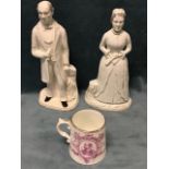 A pair of Victorian Staffordshire style figurines of Mr & Mrs Gladstone, the hollow-ware figures