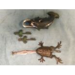 A Chinese bronze lock cast as a flat frog with tail forming catch, the leaf engraved key in the form