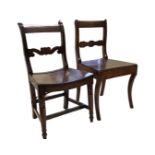 A married pair of nineteenth century mahogany dining chairs with bar backs above shaped rails, the