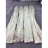 A set of four plain pale green lined curtains. (132in) (4)