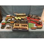 A collection of O-gauge tinplate model railway pieces, mainly Hornby Meccano - a boxed tank