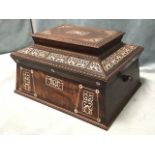 A nineteenth century rosewood sewing box of sarcophagus form, inlaid with mother-of-pearl floral