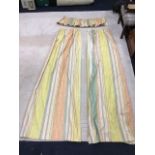 A pair of long lined striped cotton curtains in orange, yellow & green, complete with pleated
