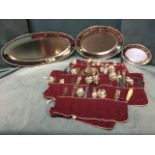 A part canteen of Sheffield silver plated cutlery; and a set of three Guy Degrenne oval French entré