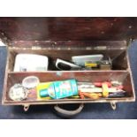 A rectangular toolbox with tray containing a quantity of tools - screwdrivers, spanners, a tenant