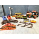 A Chad Valley clockwork saloon car; a tinplate toy clockwork lorry; various O gauge pieces of track,