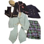 A Scottish gentleman's outfit with kilt, tweed jacket and waistcoat with horn buttons; a school