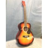 A Martin Smith acoustic steel string guitar with stained sunburst body, hardwood neck, inlaid