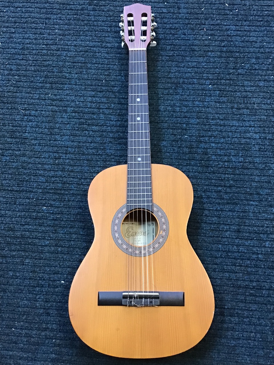 A Romanian nylon strung classical guitar by Encore - model ENC36N, with mosaic style decoration to