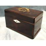 A George III mahogany tea caddy with brass handle to moulded lid, the interior with twin lidded