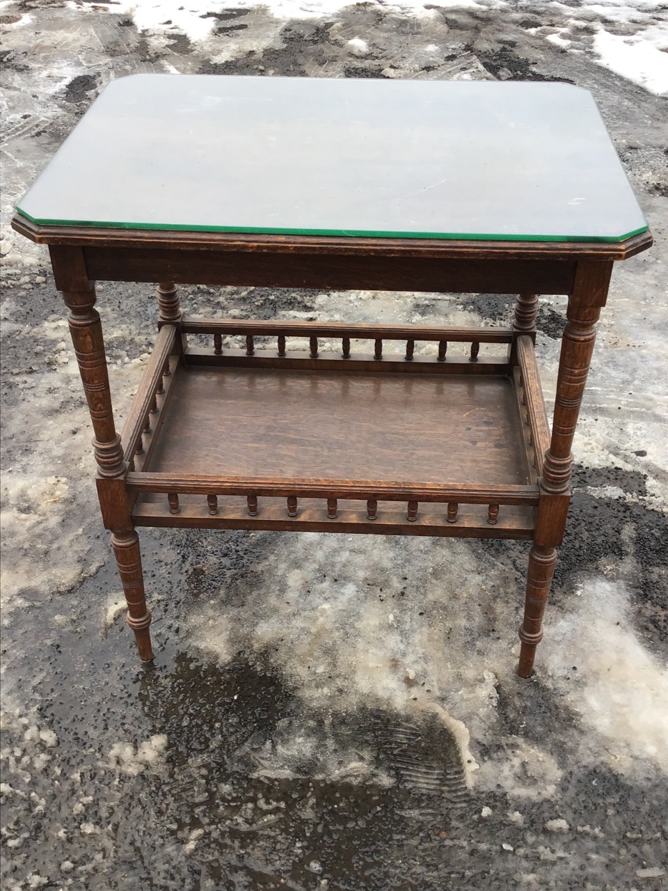 A late Victorian oak centre table, the canted moulded top with plate glass on ring-turned legs - Image 2 of 3