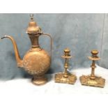 A pair of late Victorian brass arts & crafts candlesticks by Townsend & Co, the columns cast with