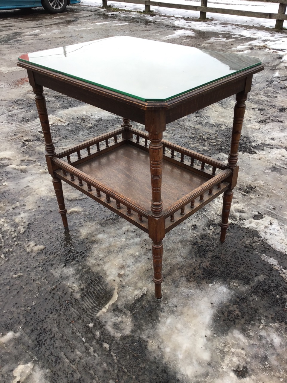A late Victorian oak centre table, the canted moulded top with plate glass on ring-turned legs - Image 3 of 3